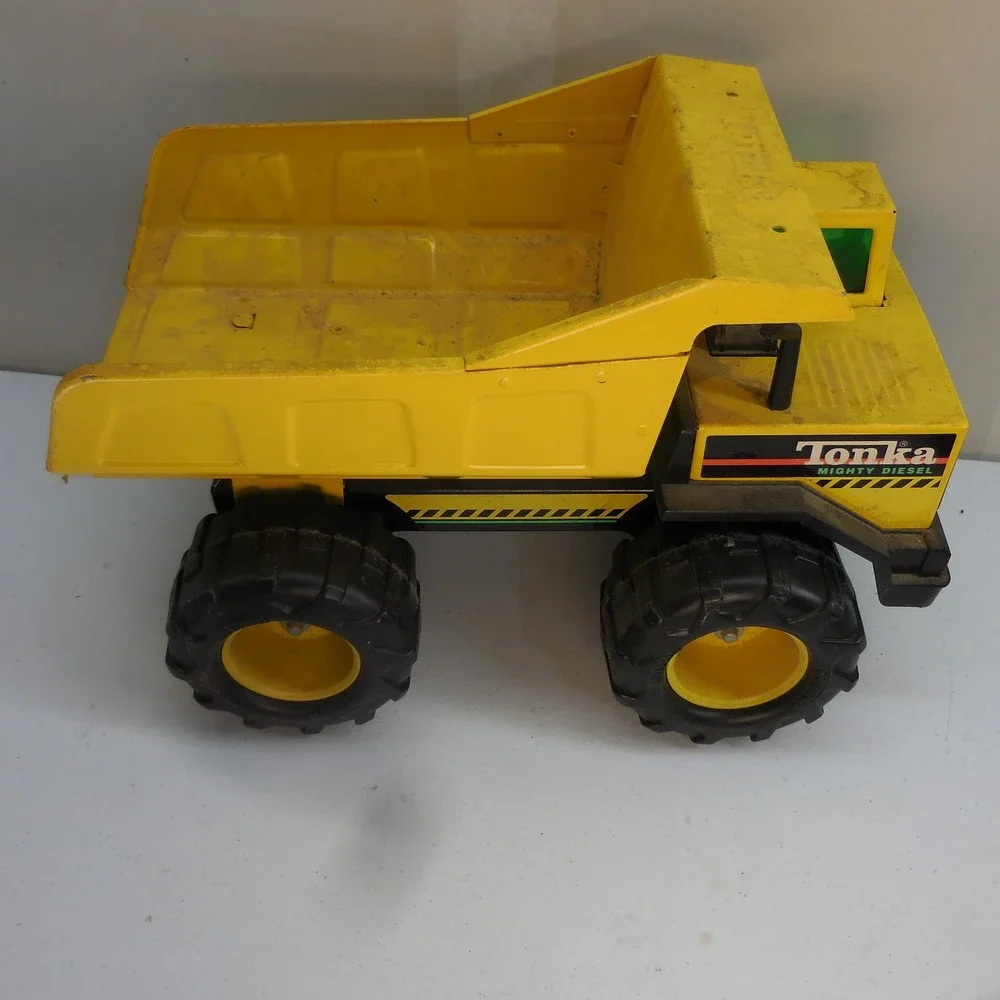 Vintage Tonka Mighty Diesel Dump Truck Yellow Pressed Steel Construction Toy